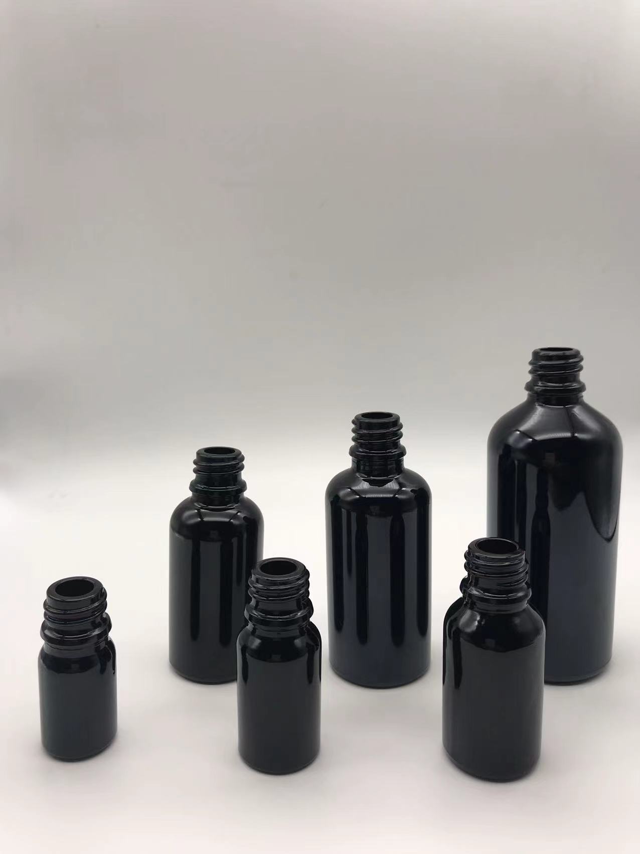 black dropper glass bottle